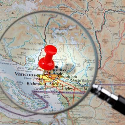 pin pointing to Vancouver on a map